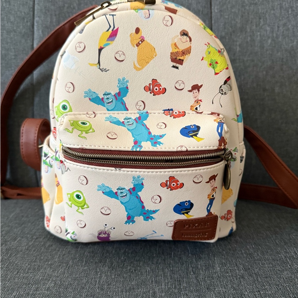 Loungefly Cream Pixar Character Mini Backpack with Colorful Print